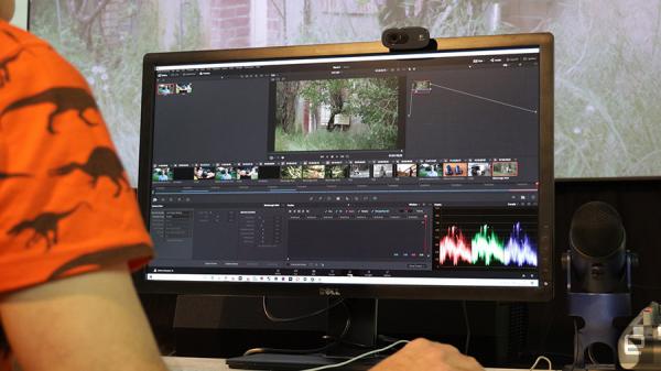 A close up of someone using DaVinci Resolve 16